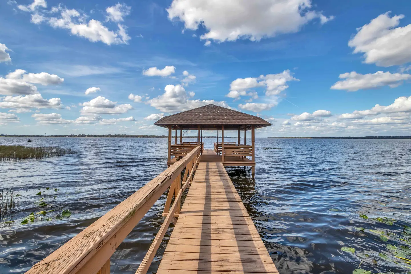 Pier extending over Lake Harris at Hide-A-Way Harbor in Astatula