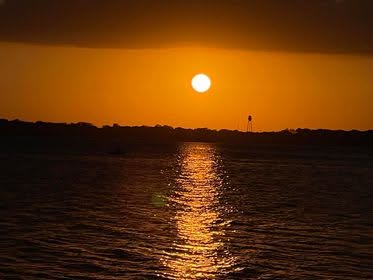 Sunset reflected on the lake at Hide-A-Way Harbor