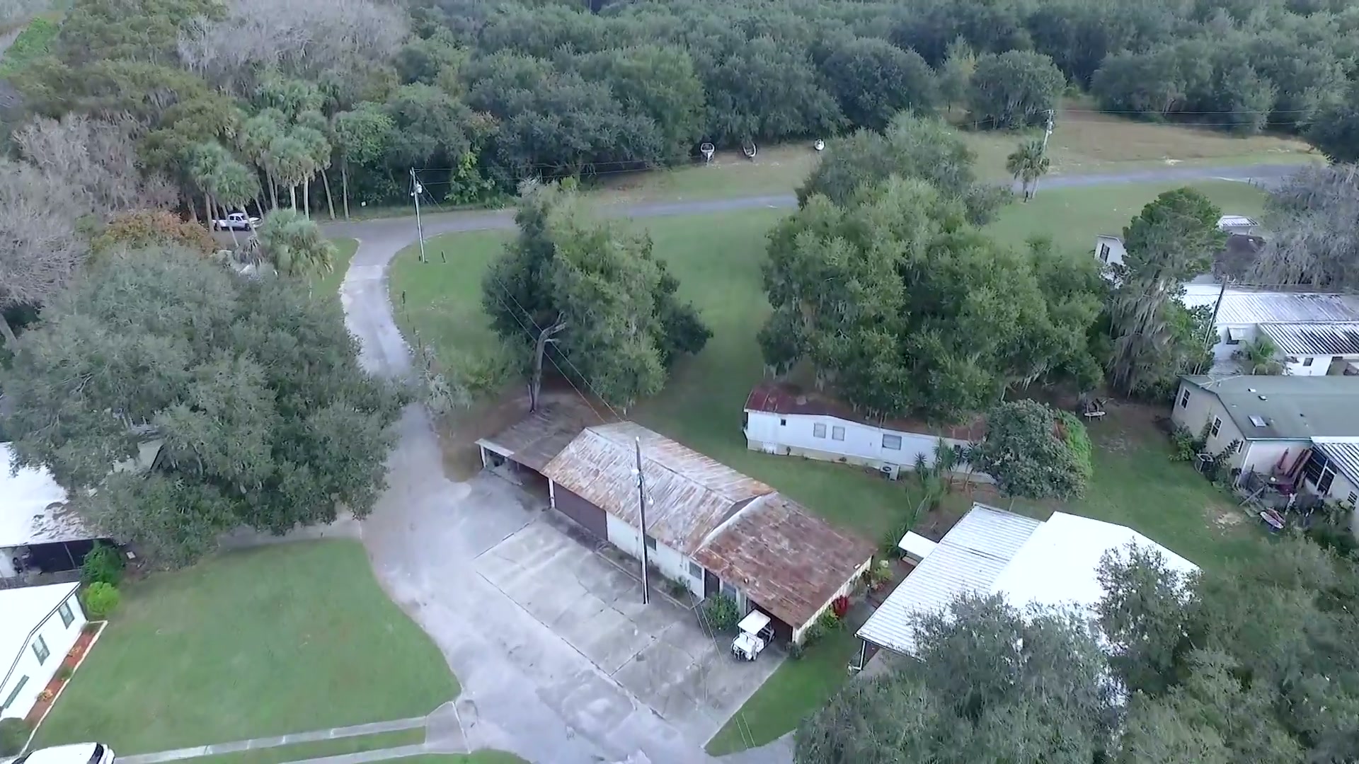 Aerial view of the tree-lined community at Hide-A-Way Harbor